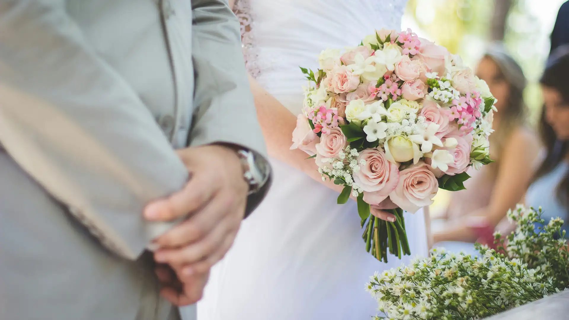 Hands of the bride and groom.