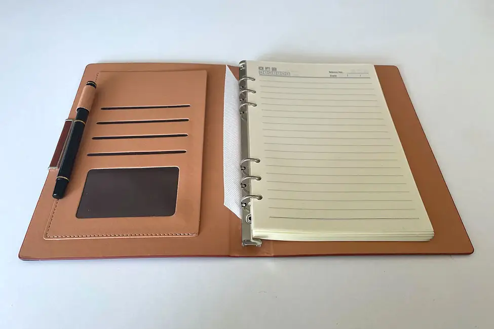 Leather writing portfolio with tablet case.